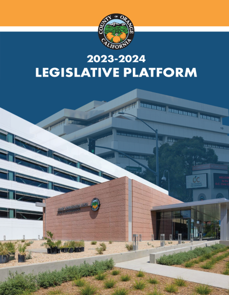 Cover of the 2023-2024 Orange County Legislative Platform. The design features a bold orange stripe at the top, with the Orange County seal centered against a blue background. Below, a modern architectural scene highlights the County Administration South building, with clean lines and landscaping featuring drought-tolerant plants. The text reads '2023-2024 Legislative Platform,' emphasizing the document's focus on governance and planning.